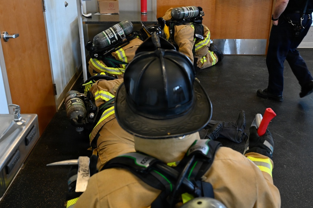 Firefighters with the Pease Fire Department and the 157th Civil Engineering Squadron in Search &amp; Rescue Exercise