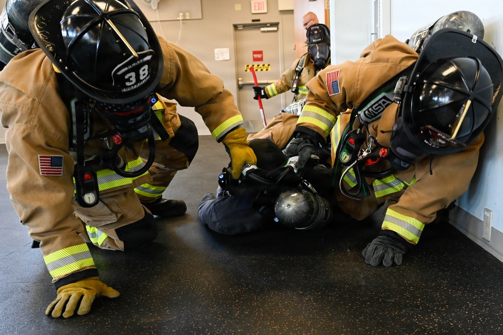 Firefighters with the Pease Fire Department and the 157th Civil Engineering Squadron in Search &amp; Rescue Exercise