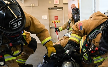 Firefighters with the Pease Fire Department and the 157th Civil Engineering Squadron in Search &amp; Rescue Exercise