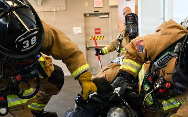 Firefighters with the Pease Fire Department and the 157th Civil Engineering Squadron in Search &amp; Rescue Exercise