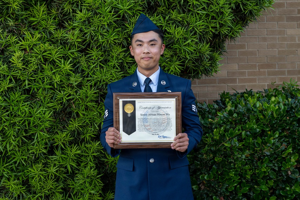 Hurlburt Field Airman honored for saving FWB woman from dog attack