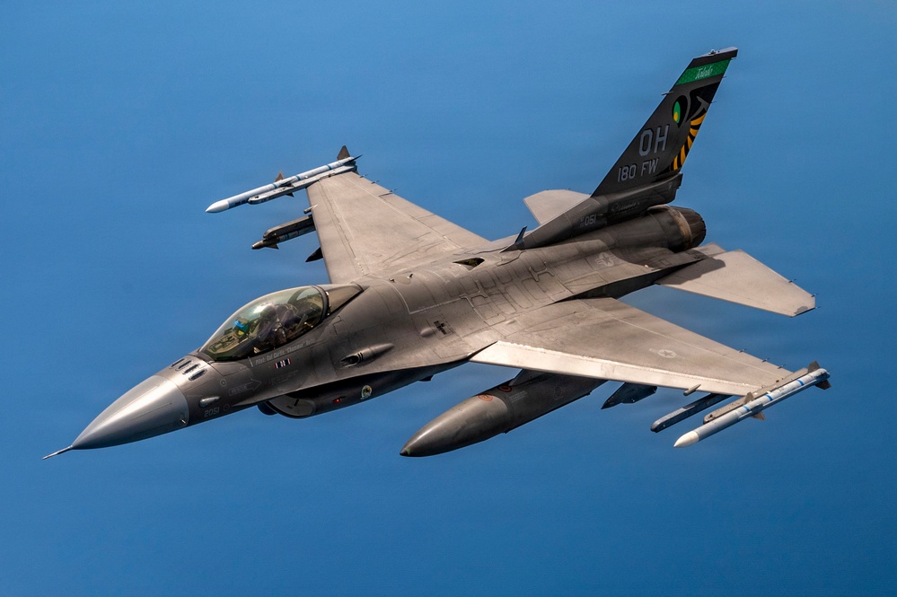 KC-135 refuels F-16