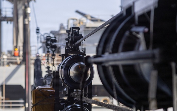 Abraham Lincoln Conducts a Fueling-at-Sea with USNS John Lewis