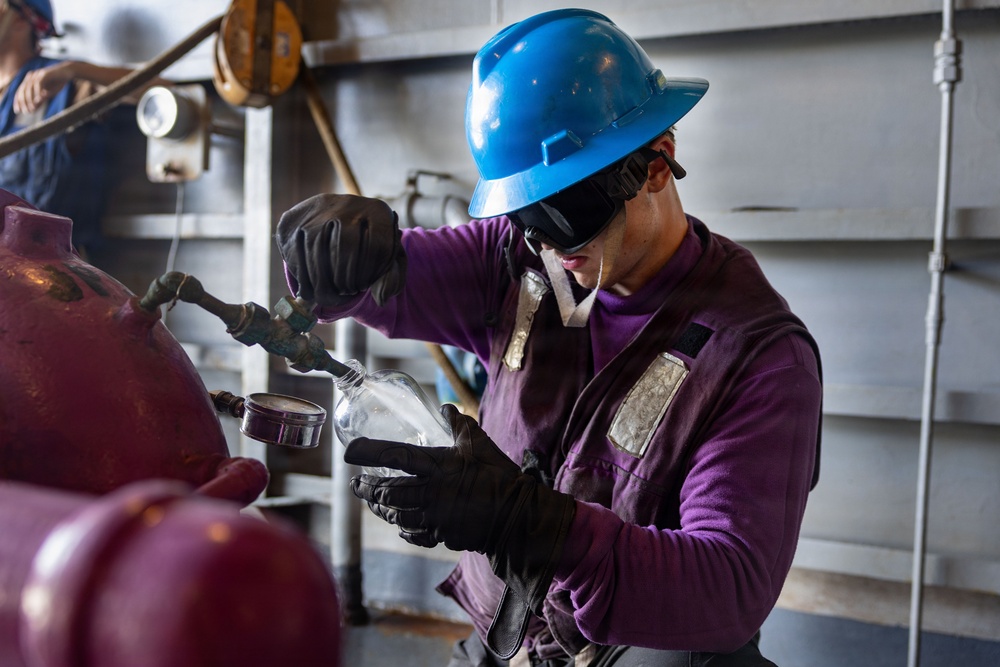 Abraham Lincoln Conducts a Fueling-at-Sea with USNS John Lewis