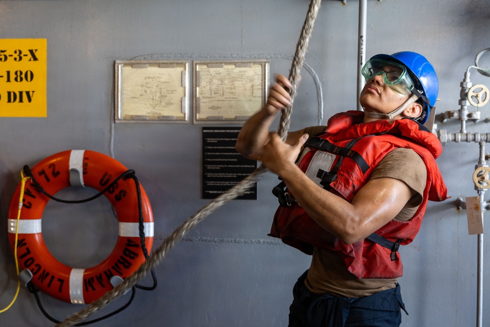 Abraham Lincoln Conducts a Fueling-at-Sea with USNS John Lewis