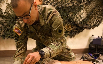 A Soldier with the 184th Expeditionary Sustainment Command, MSARNG, conducts Combat Life Saver (CLS) Training during Annual Training