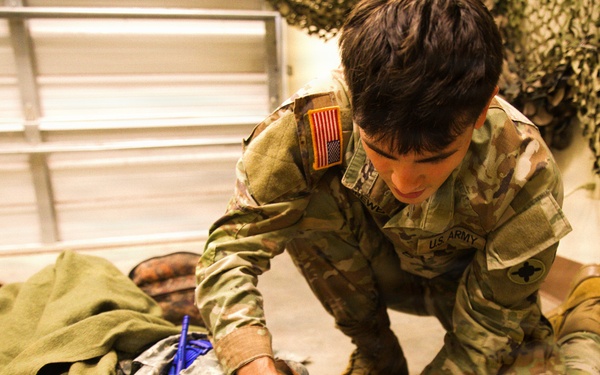 A Soldier with the 184th Expeditionary Sustainment Command, MSARNG, conducts Combat Life Saver (CLS) Training during Annual Training