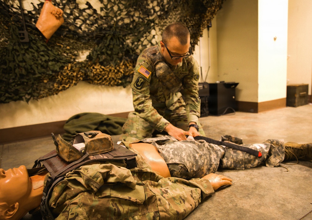 A Soldier with the 184th Expeditionary Sustainment Command, MSARNG, conducts Combat Life Saver (CLS) Training during Annual Training