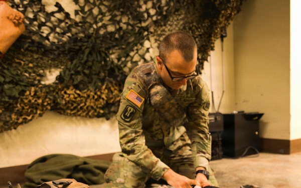 A Soldier with the 184th Expeditionary Sustainment Command, MSARNG, conducts Combat Life Saver (CLS) Training during Annual Training