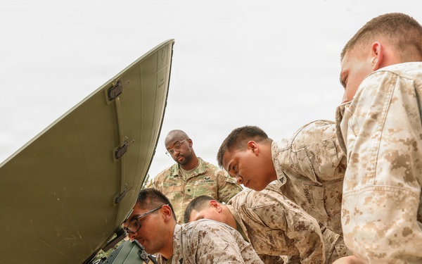 JTF-SB service members perform communication satellite training
