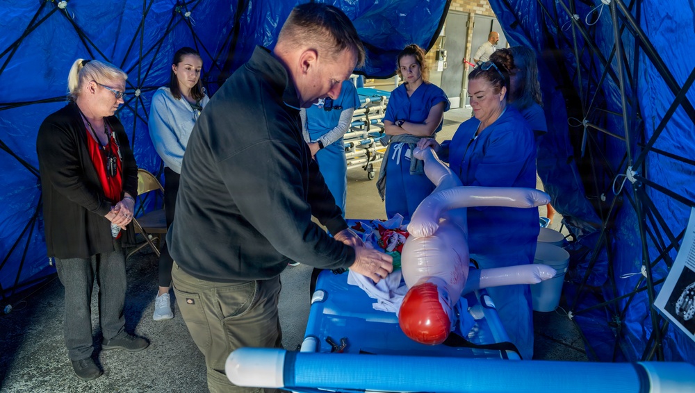 The Oregon National Guard's 102nd CERFP collaborates with Providence Milwaukie Hospital on decontamination training