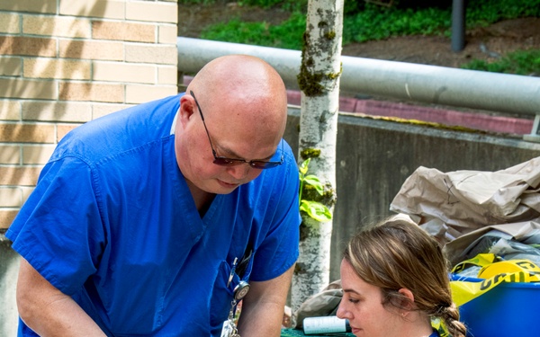 The Oregon National Guard's 102nd CERFP collaborates with Providence Milwaukie Hospital on decontamination training