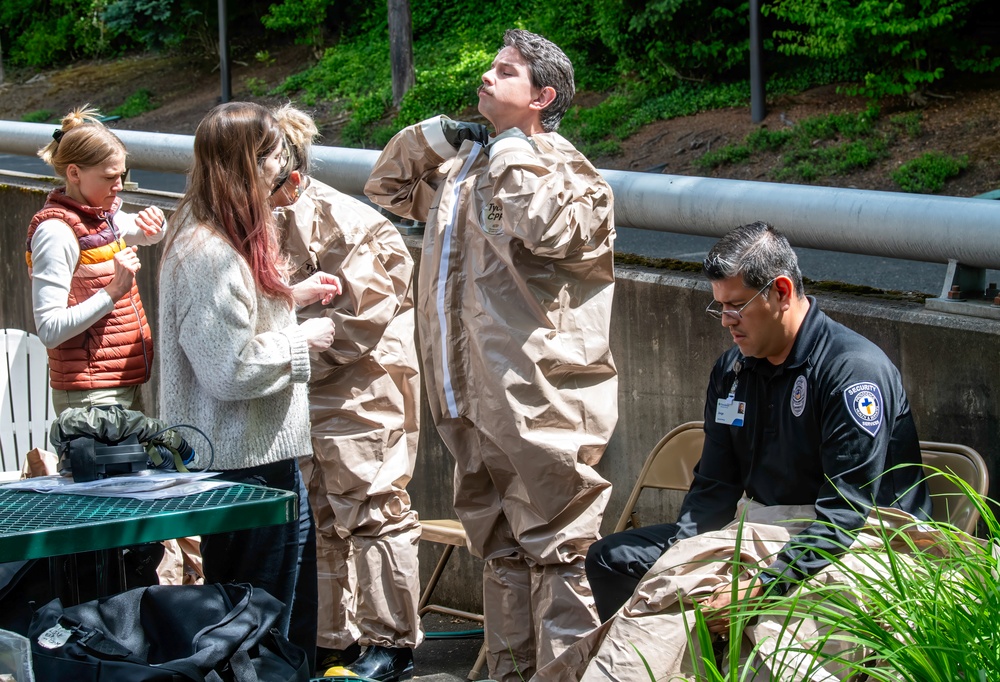 The Oregon National Guard's 102nd CERFP collaborates with Providence Milwaukie Hospital on decontamination training