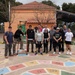 Team Souda paints a local elementary school during a community outreach
