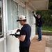 Team Souda paints a local elementary school during a community outreach event