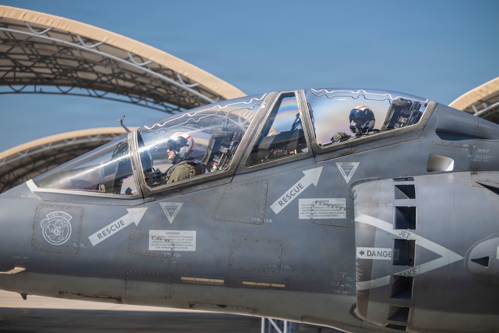 U.S. Marines with VMA-223 fly in a TAV-8B Harrier II