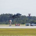 U.S. Marines with VMA-223 fly in a TAV-8B Harrier II
