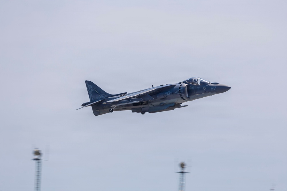 U.S. Marines with VMA-223 fly in a TAV-8B Harrier II