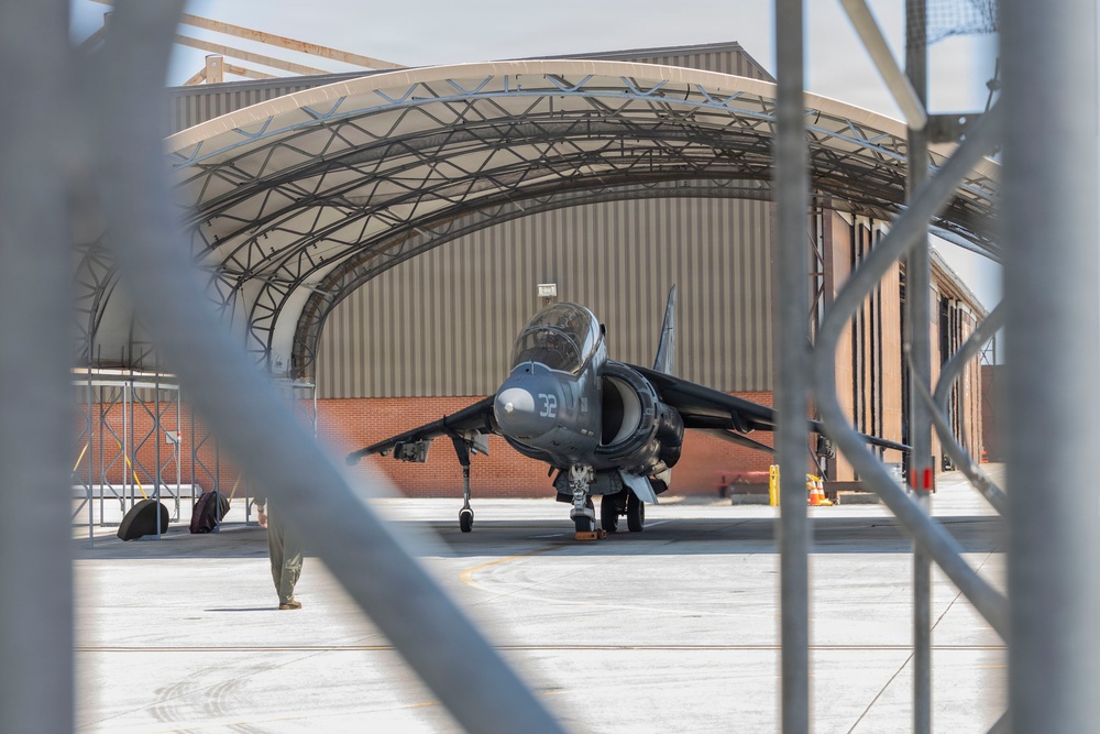 U.S. Marines with VMA-223 fly in a TAV-8B Harrier II