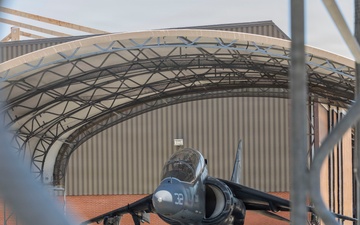U.S. Marines with VMA-223 fly in a TAV-8B Harrier II