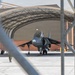 U.S. Marines with VMA-223 fly in a TAV-8B Harrier II