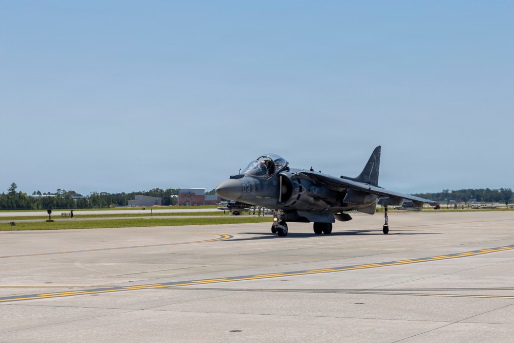 U.S. Marines with VMA-223 fly in a TAV-8B Harrier II