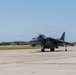 U.S. Marines with VMA-223 fly in a TAV-8B Harrier II