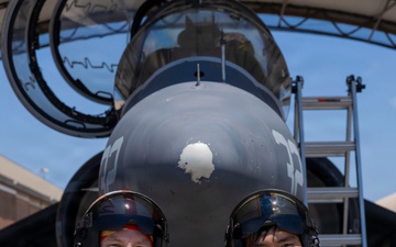 U.S. Marines with VMA-223 fly in a TAV-8B Harrier II