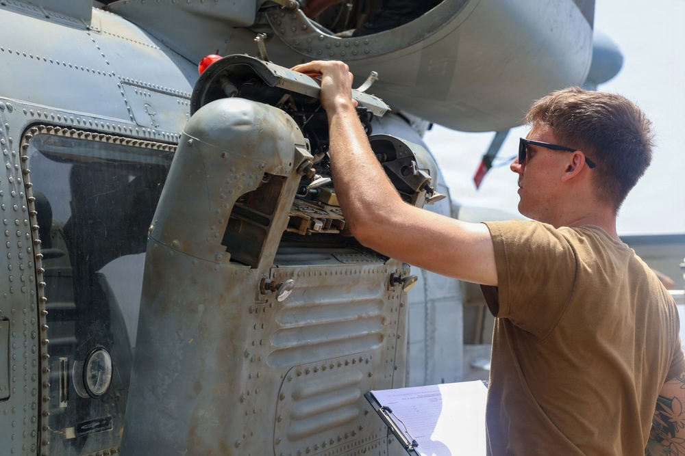 John Finn Sailors Conduct Pre-flight Maintenance