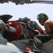 John Finn Sailors conduct pre-flight maintenance