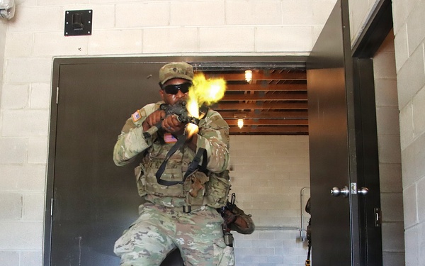 2-108th Infantry Soldier Breaches a Door During Room Clearing at JB MDL