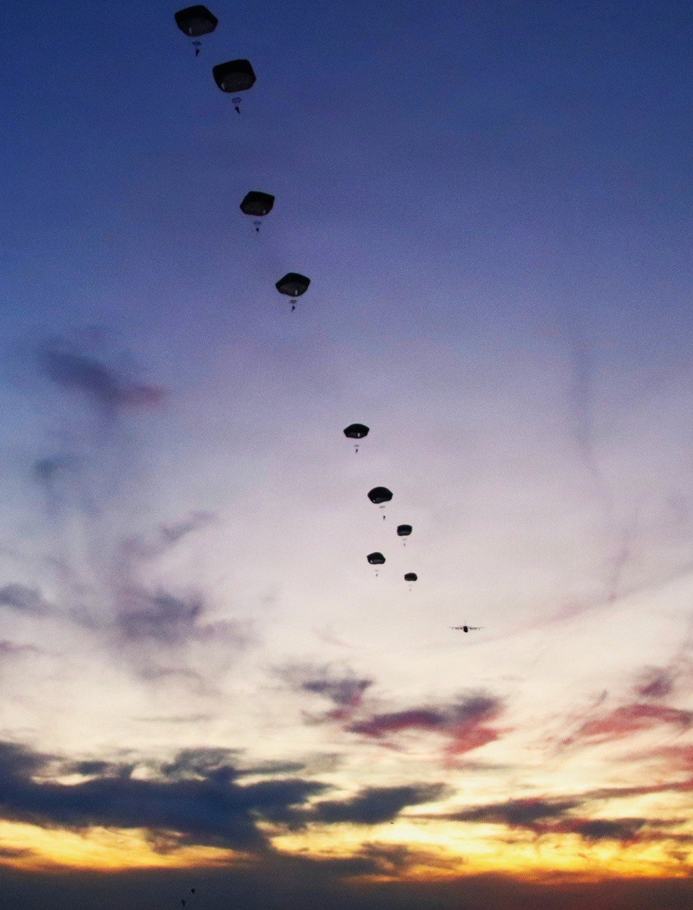 404th Civil Affairs Battalion Paratroopers Conduct Sunset Jump Near JB MDL
