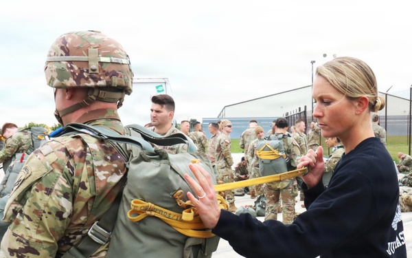404th Civil Affairs Jumpmaster Performs Final Inspection at JB MDL