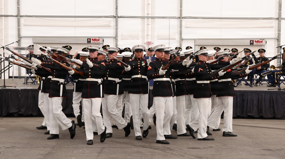 U.S. Marine Corps Silent Drill Platoon performs precision rifle exhibition during indoor ceremony