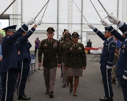 U.S. Army officers pass under saber arch during military ceremony