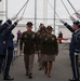 U.S. Army officers pass under saber arch during military ceremony