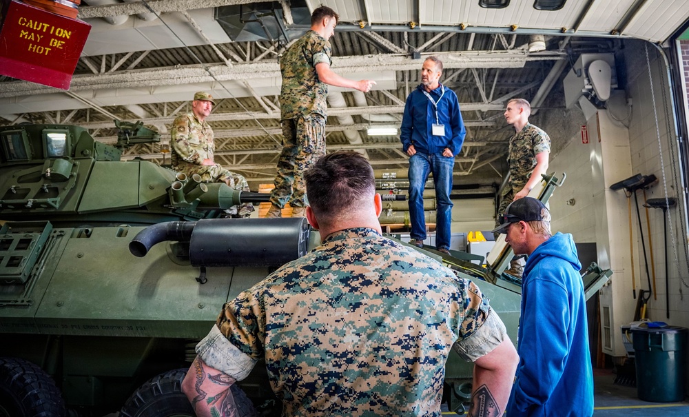 Marines Brief Civilian Visitors During Light Armored Vehicle Demonstration at Military Installation