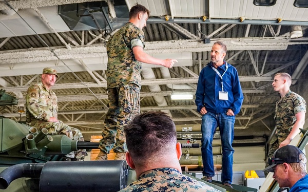 Marines Brief Civilian Visitors During Light Armored Vehicle Demonstration at Military Installation