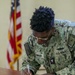 BM2 Hannah Reenlists at NCBC Gulfport
