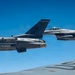 KC-135 Stratotanker refuels F-16 Fighting Falcon during security operations
