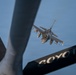KC-135 Stratotanker refuels F-16 Fighting Falcon during security operations