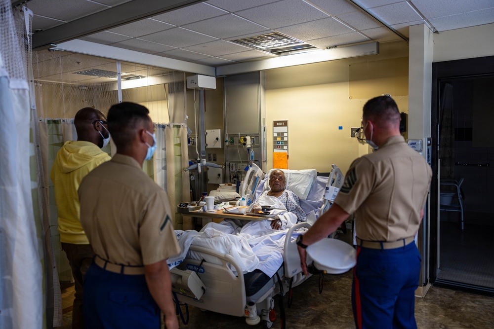 Service Members visit veterans at VA Hospital