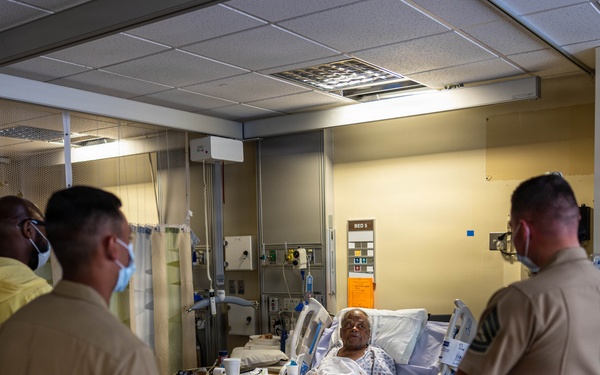 Service Members visit veterans at VA Hospital