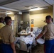 Service Members visit veterans at VA Hospital