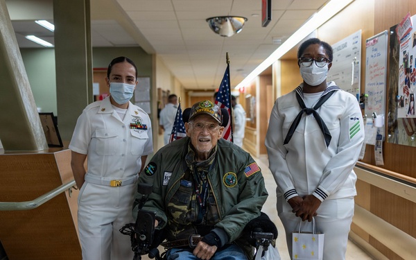 Service Members visit veterans at VA Hospital