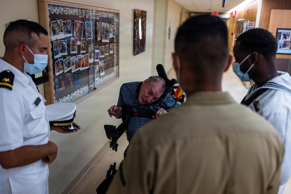 Service Members visit veterans at VA Hospital
