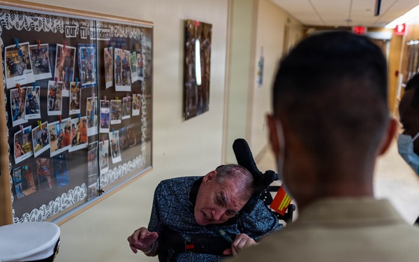Service Members visit veterans at VA Hospital