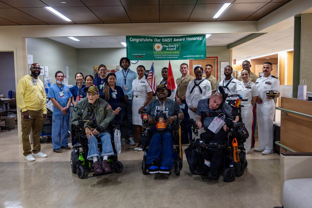 Service Members visit veterans at VA Hospital