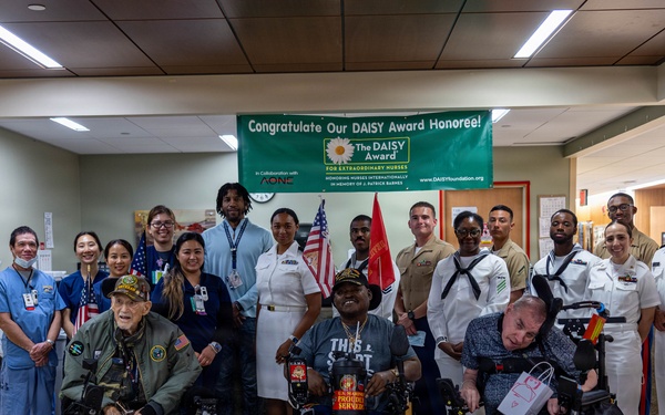 Service Members visit veterans at VA Hospital