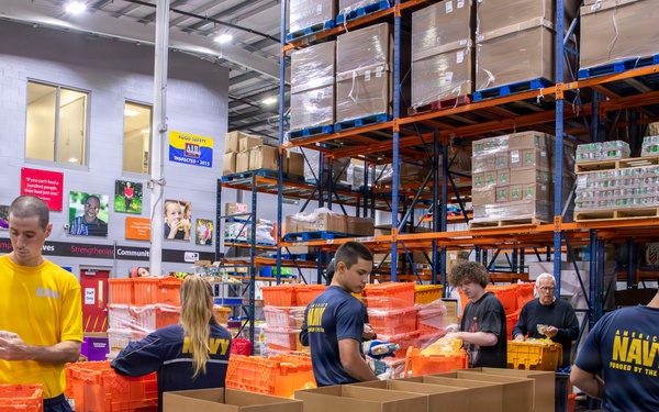 Sailors volunteer at Central Pennsylvania Food Bank during Harrisburg Navy Week